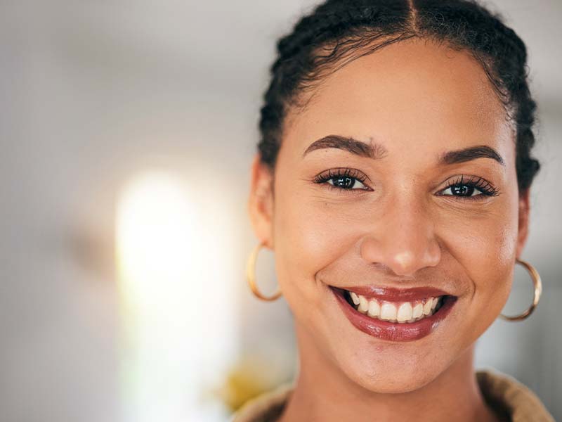 Woman with braided hair smiling