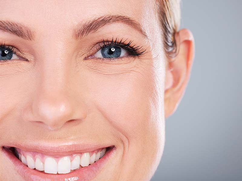 Close-up portrait of a mature woman smiling